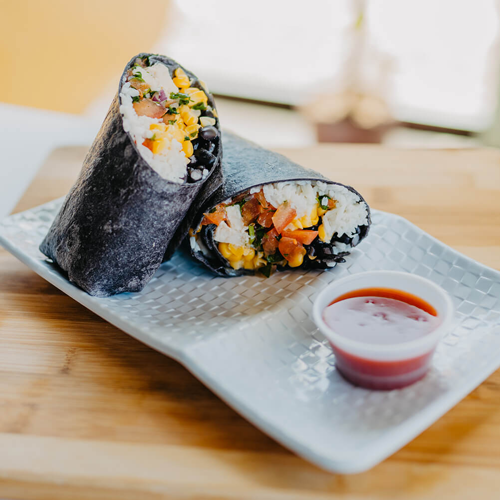 Southwest Black Bean Wrap - Chicken, Black Beans, Jasmine Rice, Sweet Corn, and Pico De Gallo on a Tomato Basil Wrap