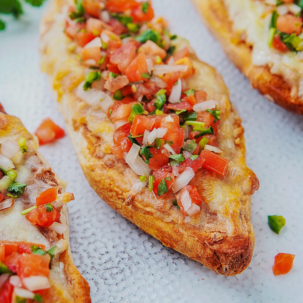 Molletes with Beans and Cheese